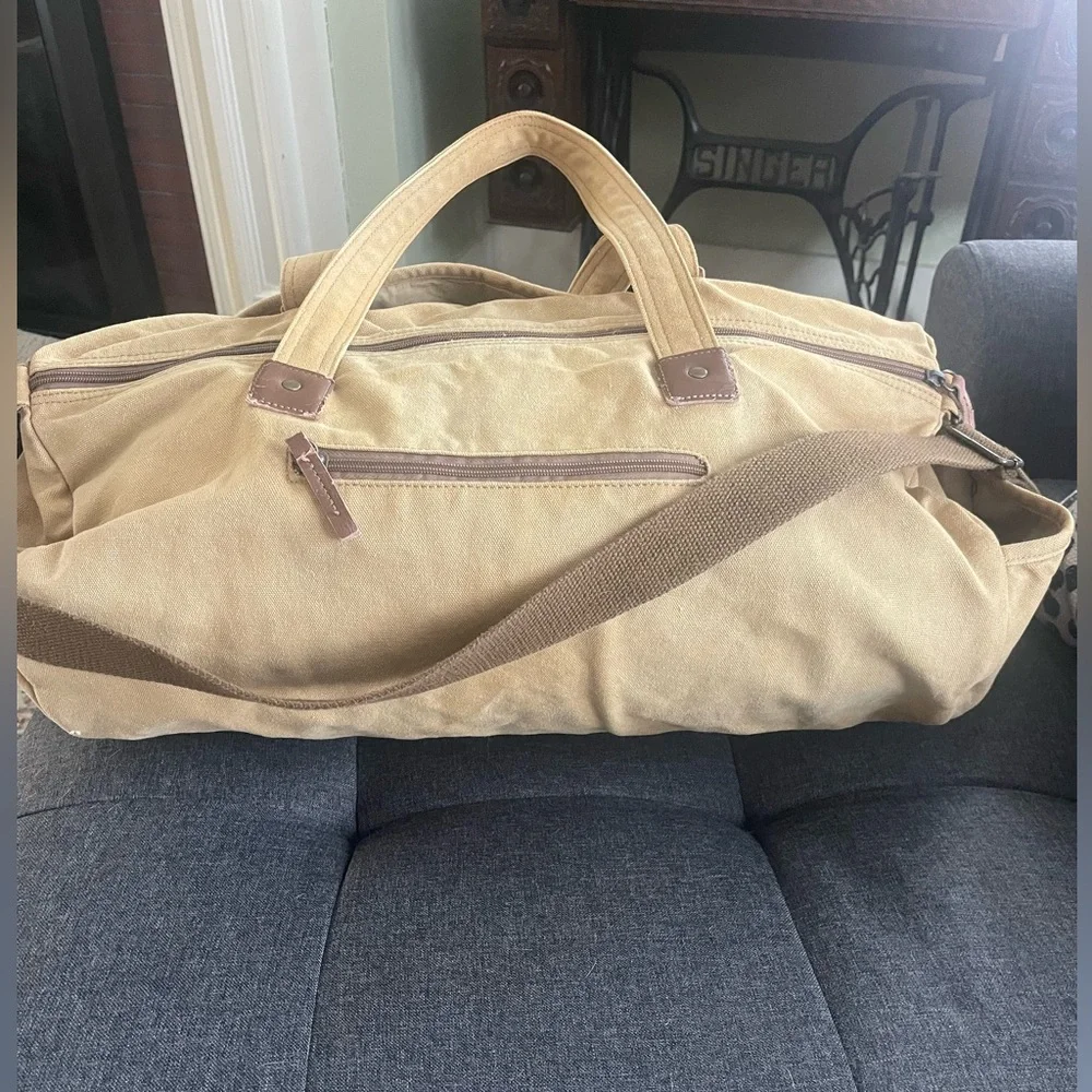 Canvas utility duffle travel bag .